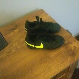 Nike Tiempo Cleats Black with yellow swoosh Size 10C Worn one soccer season